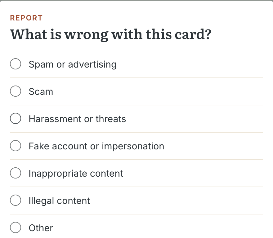 Reporting a card: the reason, a description and the send button; a person decides every report.